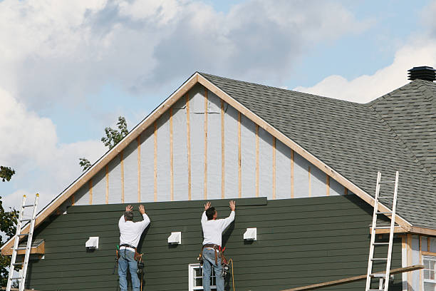 Professional Vinyl Siding technician working in Nevada, OH